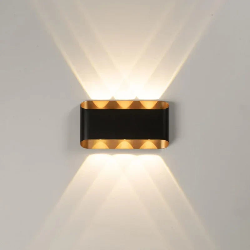 Black-wall-light-with-golden-inner-finish
