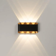 Black-wall-light-with-golden-inner-finish
