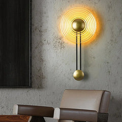 Modern-sensor-wall-light-with-golden-circular-design