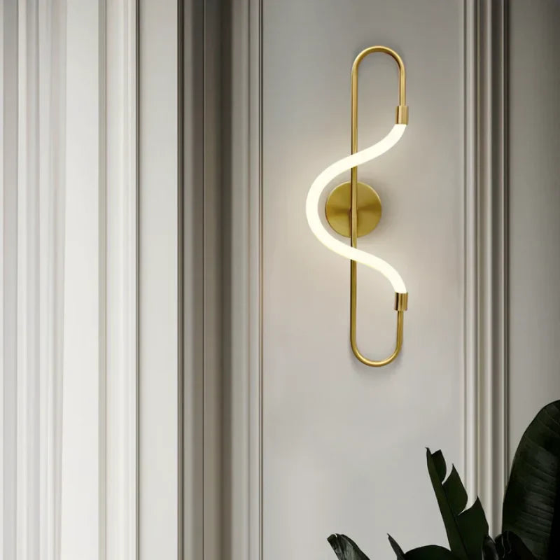 Modern-spiral-LED-wall-light-in-gold-finish