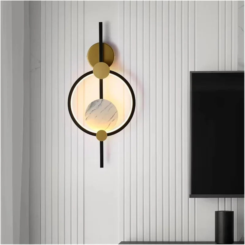 Nordic-bedside-wall-light-with-black-and-gold-frame

