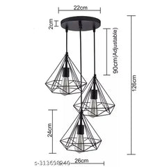 Three-black-diamond-shaped-hanging-lights-suspended-over-a-dining-table